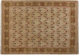Detailed corner showing the pictorial lion and bird motifs on a vintage Spanish carpet.