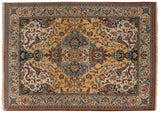 A corner view highlighting the vintage carpet's intricate floral spandrel and detailed Islimi border.