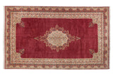 Raspberry red Vintage Indian Kerman carpet with ivory floral medallion and Safavid dragon motif border, 11'7
