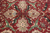 The plush, full pile of a vintage Indian Agra carpet with its elaborate floral arabesque.