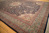 Vintage Ardebil rug corner displaying ivory spandrel, blush and sea foam green borders.