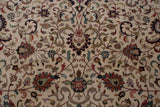 Intersecting cloud-band and lotus flower motifs on the plush, even pile of a vintage hand-knotted Agra carpet.