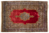 Rococo style sky blue border with scrolling vines on a fine vintage Kerman carpet corner.