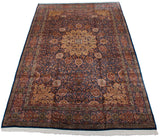 Angled view of a vintage Ardebil design carpet, showcasing its complex medallion and floral field.