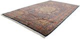Angled view of a fine Pakistani Ardebil carpet, showing its full length and intricate floral design.