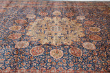 Perspective view of the vintage Ardebil carpet's intricate thousand flower design surrounding the central arabesque medallion.