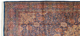 Corner detail showing the beige spandrel and arabesque borders of a fine vintage Ardebil carpet.