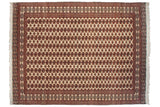 Vintage Pakistani Bokhara carpet with repeating geometric guls in cherry red and navy on an ivory-gold field.