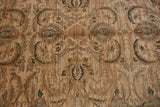 Vintage Agra carpet detail: scrolling leaves, palmettes, and abrashes in muted green, copper, silver.