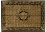 The intricate geometric field and wide floral borders of a vintage Indian Savonnerie carpet.