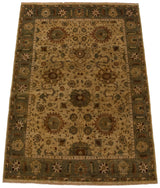 Vintage Indian Sultanabad rug's ornate ivory field with delicate floral vinery and olive green border.