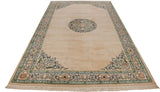 Full view of a vintage Japanese Peking carpet showing its roundel medallion and symmetrical corner spandrels.