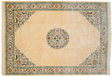 Symmetrical vintage Japanese Peking carpet with a central roundel medallion and ornate corner spandrels.