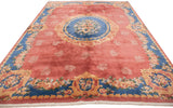 Full length perspective of a vintage Japanese Aubusson carpet in raspberry, blue, and gold.
