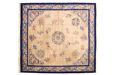 Hand knotted Vintage Japanese Peking square carpet, ivory field, floral roundel, blue border.