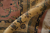Full pile height of vintage Mohajeran Sarouk showing dusty rose florals and ivory fringe.