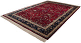 Full perspective of the Indian Mohajeran Sarouk carpet highlighting its plush pile and navy border.