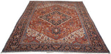 Angled view of vintage Bakshaish carpet featuring diamond medallion, geometric motifs, and saturated tones.