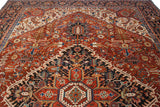 Vintage Bakshaish rug with geometric serrated leaves and blossoms in cherry red and navy.