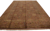 Vintage hand-knotted Agra carpet, copper field with allover floral lattice and millefleur border.