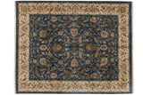 Agra carpet, deep denim blue field with sprawling floral vinery, palmettes, and ivory meandering border, 11'7