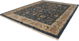 Corner of Agra carpet, ivory border with expressive leaves, deep denim blue field, and fringe.
