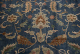 Agra carpet detail: Full pile and deep denim blue field with bronze palmettes and delicate vinery.