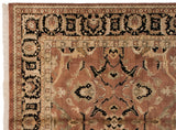 Agra carpet corner detail: Bronze field, black stylized Safavid-inspired vine border, ivory fringe.