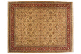 Fine Agra carpet with an allover palmette lattice design on a gold field with a floral burgundy border.