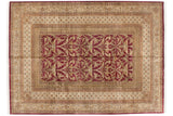 Vintage Indian Art Nouveau carpet, deep cochineal red field, sprawling arabesques, beige borders.