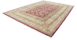 Indian Art Nouveau carpet corner: cochineal red field, beige borders, white fringe, side selvage.