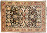 Soft wool pile with large-scale floral palmettes and sprawling vinery on a chocolate brown field.