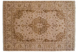 Hand-knotted Indian Tabriz design carpet with roundel medallion and floral field in ivory and bronze.