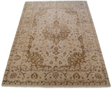 Indian Tabriz carpet corner showing serrated leaf border and delicate floral field in bronze.