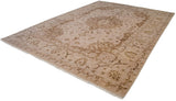 Ivory Indian Tabriz rug corner with serrated leaf border and delicate floral motifs.