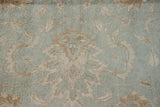 Powder blue Indian Oushak design featuring serrated palmettes and cloudband motifs.