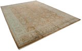 Indian Oushak rug corner: traditional bronze, ivory palmettes, delicate vinery, original selvage.