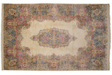 Vintage Kerman carpet, Rococo medallion, ivory field, blue, pink floral spandrels and border.