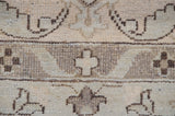 Intricate vinery and distinct cross motif in oxidized silver and ivory pile.