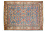 Fine Pakistani rug in a Caucasian Perpedil design with red rams horn motifs on a sky blue field.