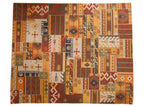Hand woven patchwork Kilim rug, geometric panels, prominent cross-hatch stitches, warm earthy palette, 8x10.