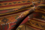 Geometric patterns and raised cross hatch stitches on a multi-color patchwork Kilim rug.