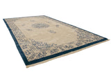Vintage Indian Peking design carpet corner, thick plush ivory pile with indigo blue scrolling vinery.