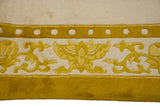 Golden saffron butterfly and pearl border detail of the vintage Indian Peking rug.