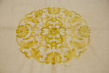 Plush ivory pile with saffron yellow scrolling vinery on a vintage Indian Peking rug.