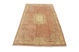Indian Aubusson design carpet corner, highlighting rose field, pastel floral border, and fringe.