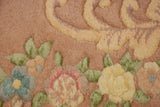 Vintage Indian Aubusson design rug featuring blush, gold, blue, and sage floral motifs.