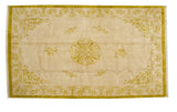 Ivory and gold vintage Indian Peking carpet with roundel medallion and scrolling vinery.