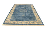 Vintage Indian Peking carpet corner, ivory border with blue germinating plants and cloudband motifs.