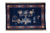 Vintage Peking rug, pictorial scene of dragon vase, blossoms, cobalt blue, terra cotta border.